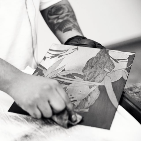 /The talented @danielbrown__ at work on his plate and the final print. 