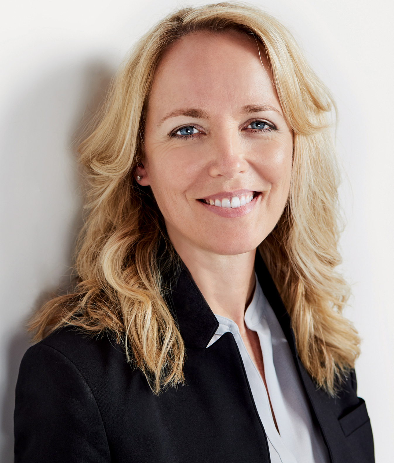 Portrait of Transportation Design alumna Tisha Johnson, vice president of interior design at Volvo