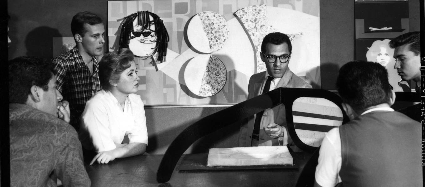 Lou Danziger (right) critiquing students’ work, 1959