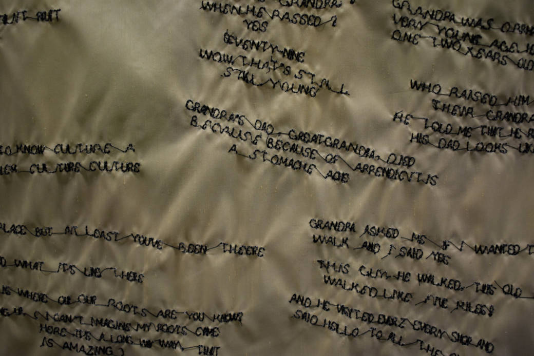 embroidered text on quilt made by Camille Papa