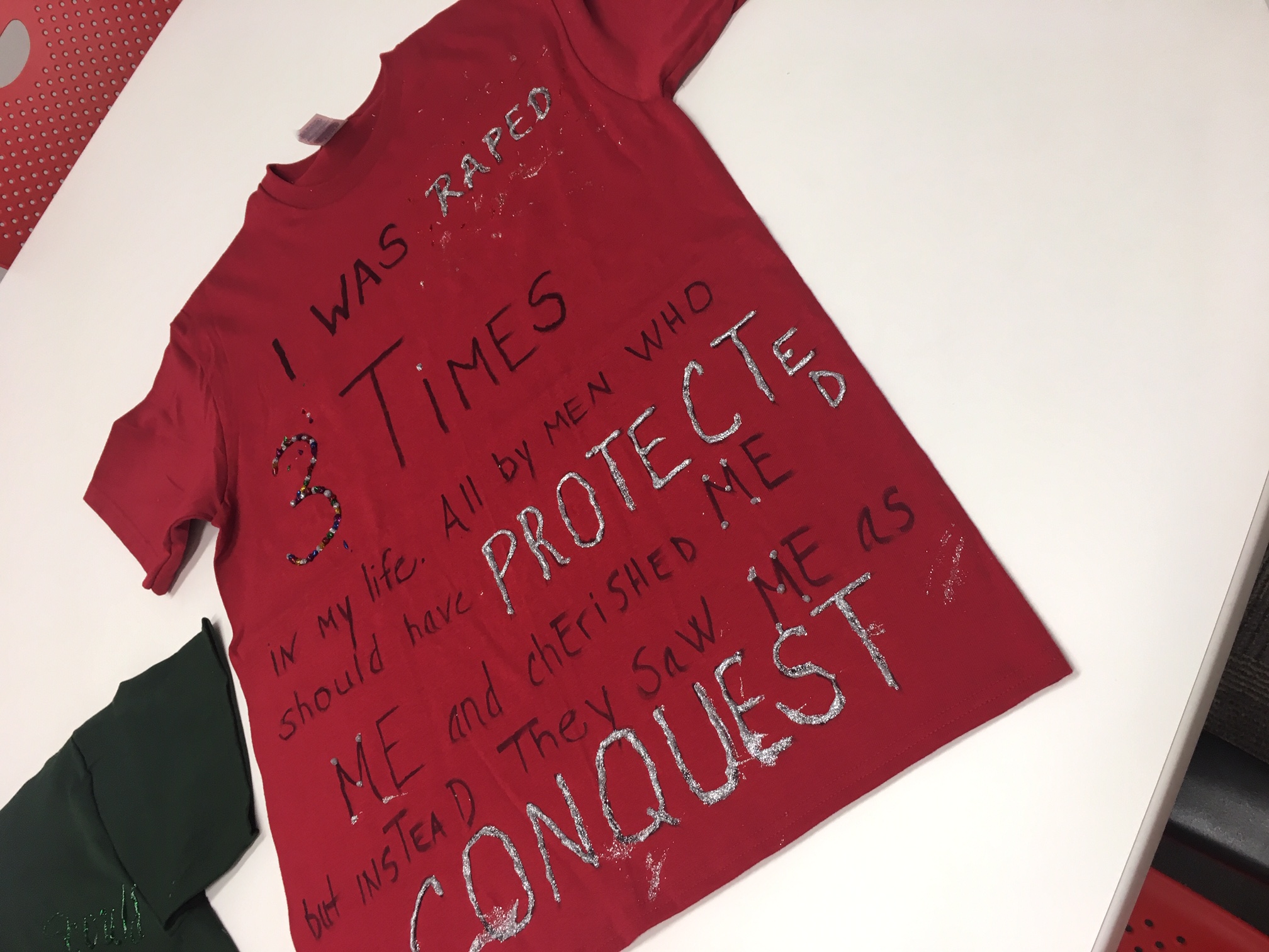 Photo of a t-shirt created by a survivor for the Clothesline Project on campus.