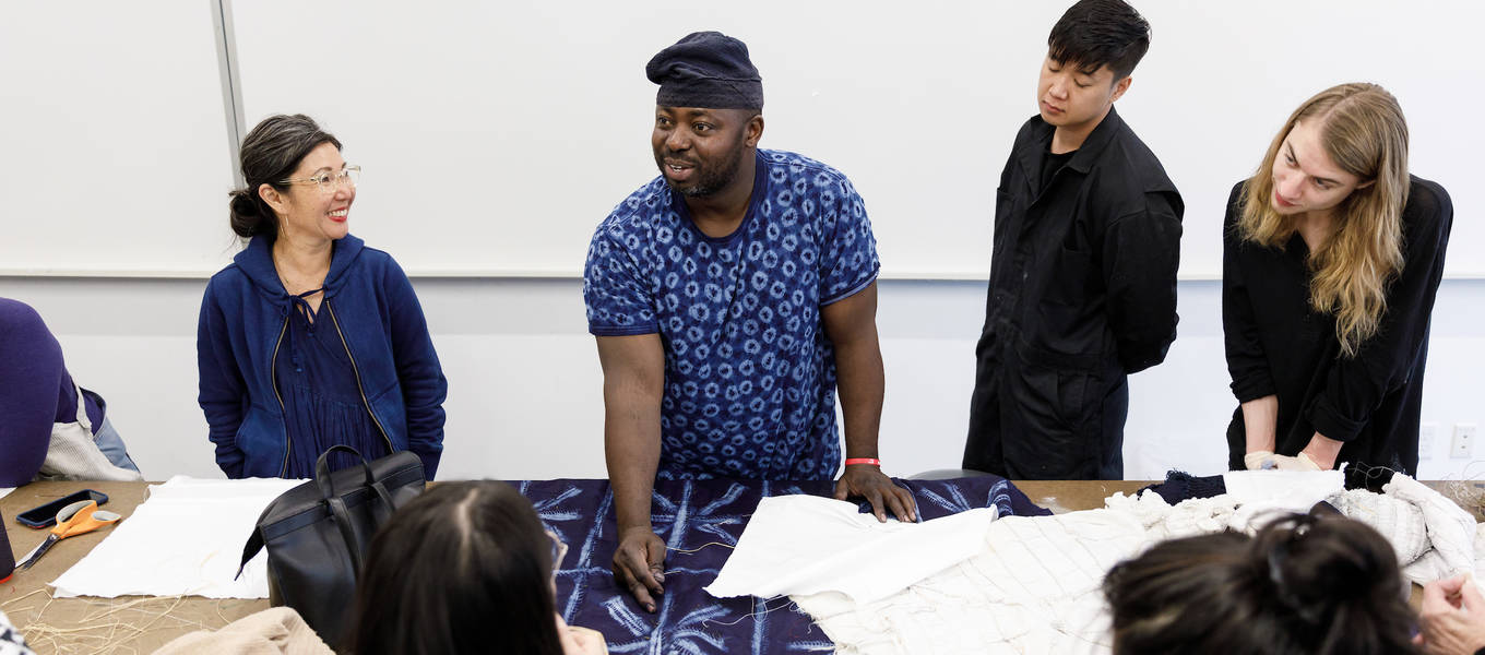 Guest and indigo dye master Gasali Adeyemo (center) and guest Christina Kim (left), the founder of the eco-conscious Los Angeles brand Dosa, with students in the Spring 2019 TDS Indigo, photo by Juan Posada