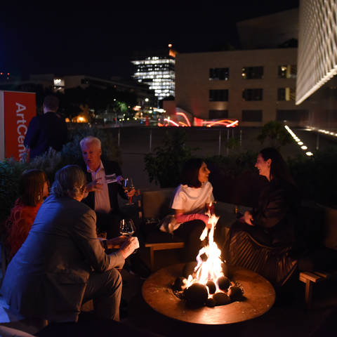 people around a fire pit