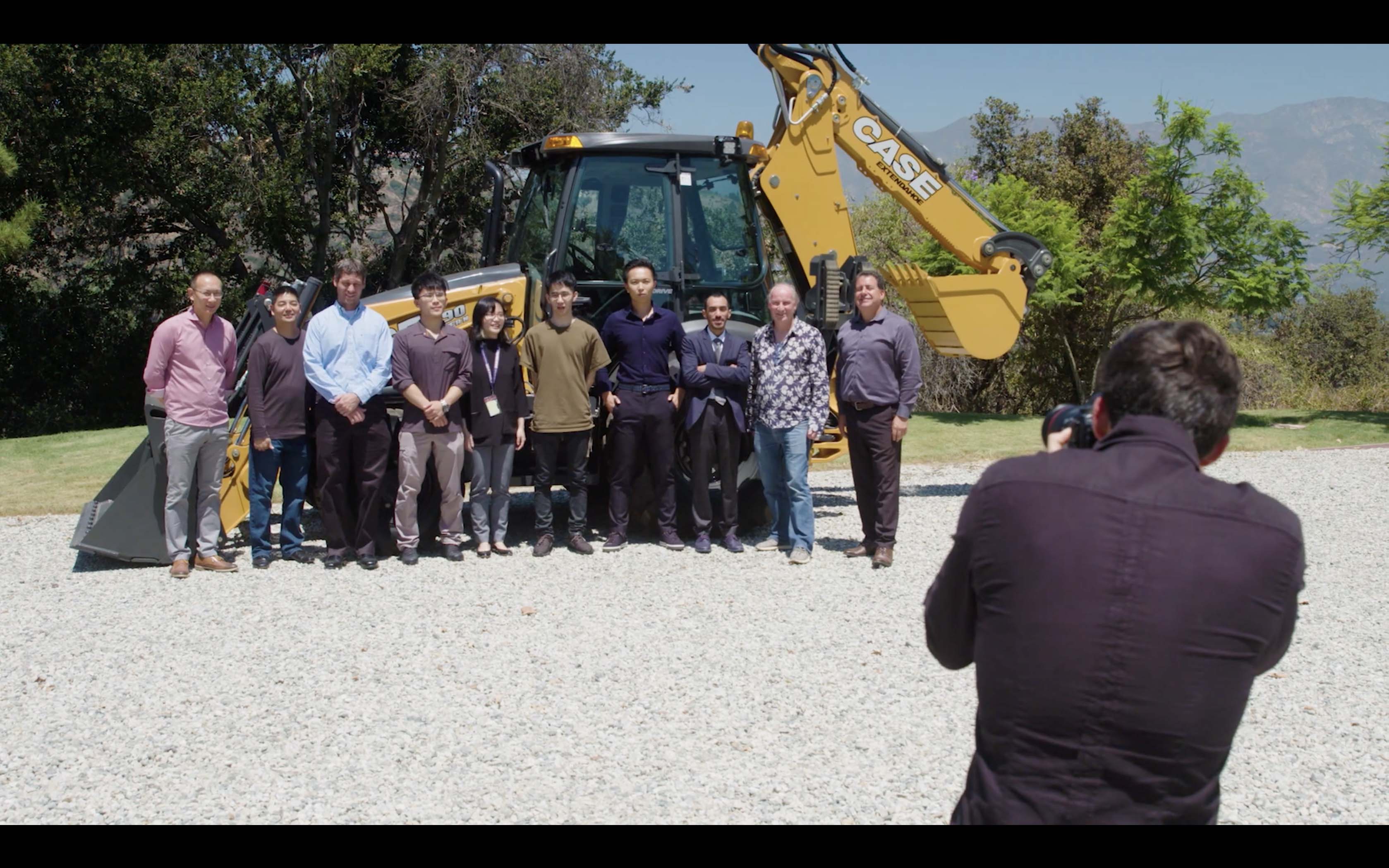 Photo of CNH Industrial sponsored project class with backhoe.