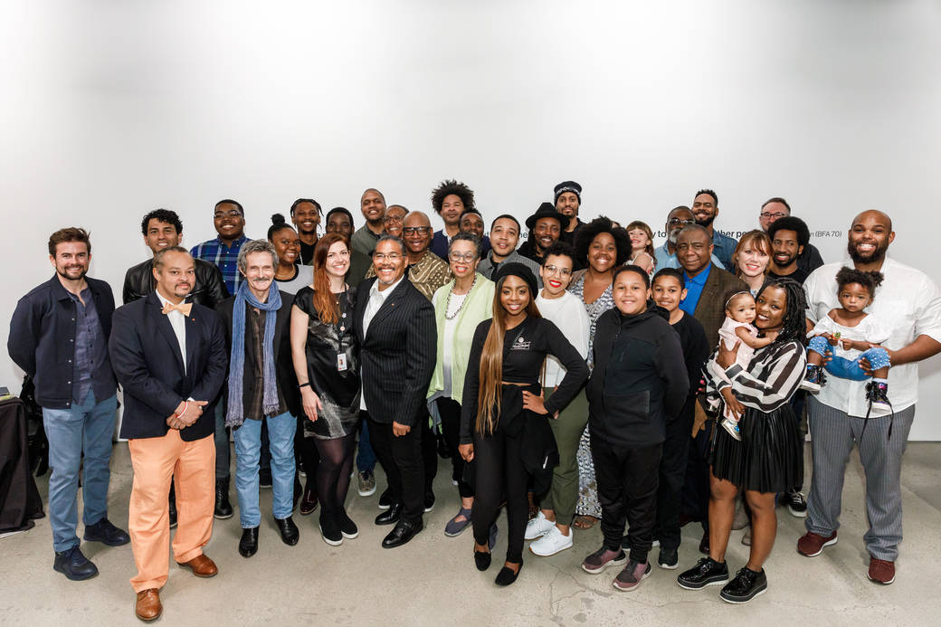 Group photo of alumni, staff, faculty and student attendees at the Spring 2020 Impact/300 Black Alumni Mixer 