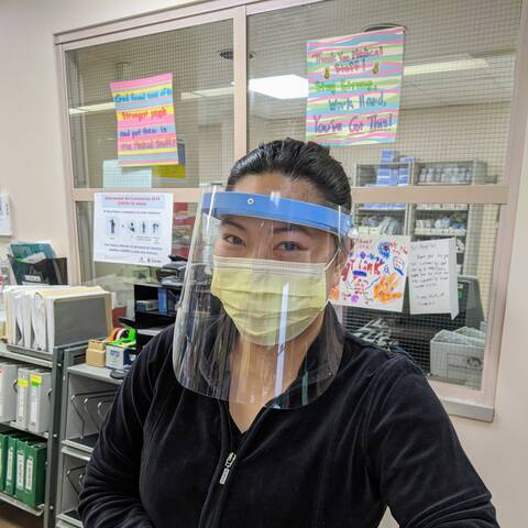 person wearing face shield