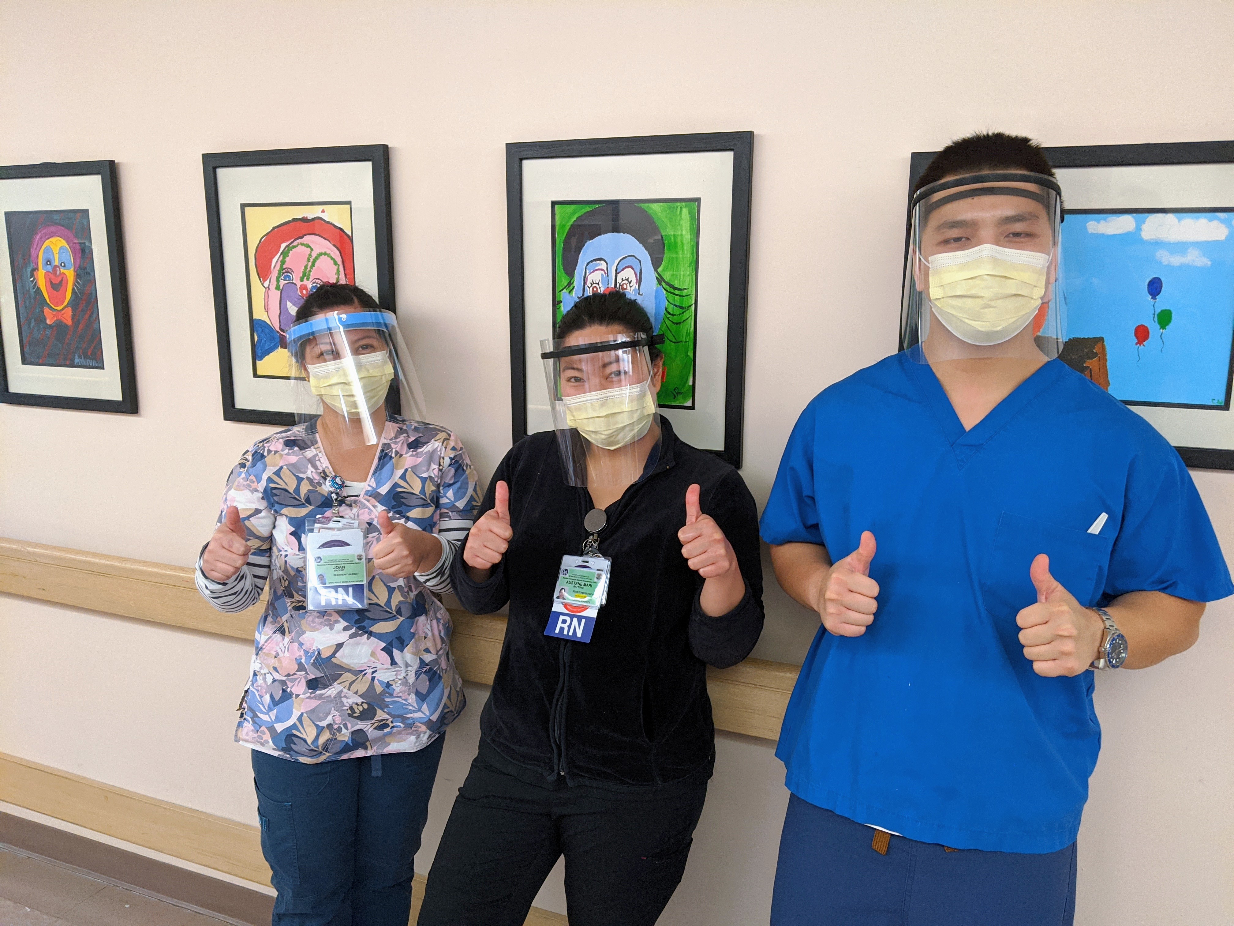 photo of health care workers wearing face shields
