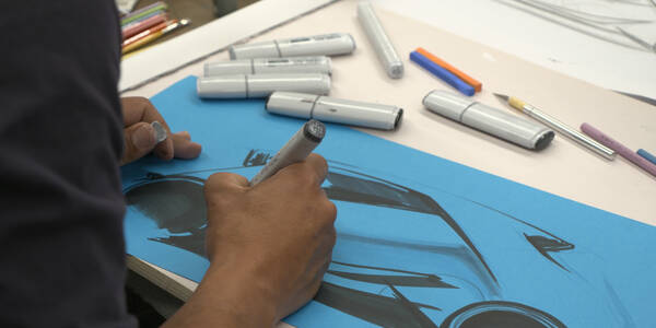 advanced supercar sketch on blue paper