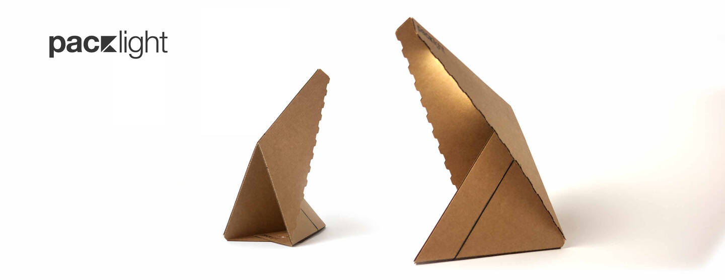 A+lamp+made+from+its+own+packaging.+The+unique+design+and+material+choices+is+an+example+of+exploration+and+experimentation+of+sustainability+best+practices.