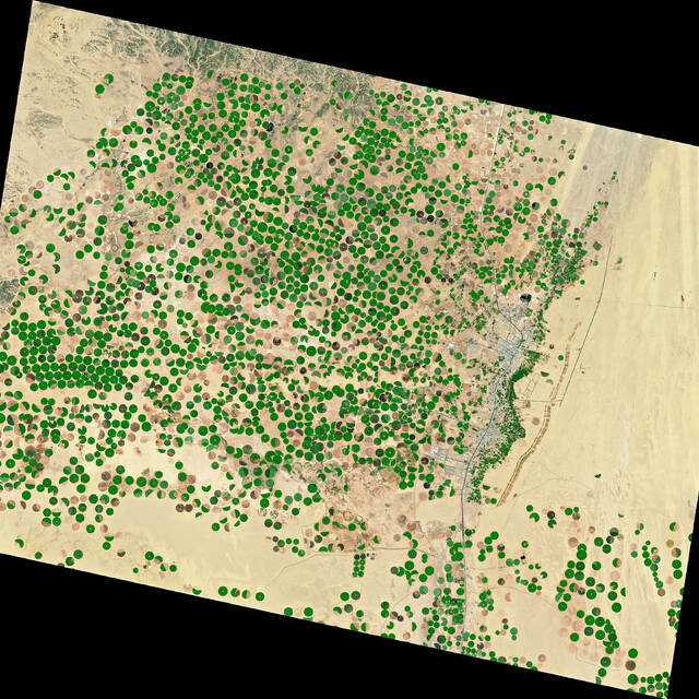 The+kingdom+of+Saudi+Arabia+has+no+permanent+rivers+or+lakes.+What+it+does+have+are+wadis%2C+valleys+that+are+transformed+into+ephemeral+rivers+after+storms%2C+and+aquifers.+This+image+shows+the+spread+of+agriculture+around+the+town+of+Wadi+ad-Dawasir.+The+aquifer+and+irrigation+have+been+used+to+green+up+portions+of+the+desert.+The+water+table+in+this+area+has+dropped+as+much+as+6+meters+%2820+feet%29+per+year%2C+fast+enough+that+scientists+think+the+aquifer+could+be+depleted+within+a+few+decades.+It+is+the+most+stressed+of+the+world%E2%80%99s+thirty-seven+largest+aquifers.