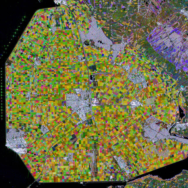 Flevoland+is+the+Netherlands%E2%80%99+newest+province+and+one+of+the+largest+land-reclamation+projects+in+the+world.+With+almost+a+third+of+its+territory+lying+below+sea+level%2C+the+Netherlands+%28whose+very+name+means+%E2%80%9Clow+country%E2%80%9D%29+has+a+long+history+of+land+reclamation.+After+major+floods+the+Zuiderzee%2C+a+large%2C+shallow+inlet+of+the+North+Sea%2C+was+partially+drained+and+closed+off+to+create+a+lake%2C+the+Ijsselmeer%2C+to+improve+flood+protection+and+also+provide+additional+land+for+agricultural+use.+Each+colorful+patch+represents+a+different+crop.+To+the+west%2C+along+the+dikes+of+the+Ijsselmeer%2C+is+one+of+the+largest+wind+farms+in+the+Netherlands.+May+8%2C+2018.