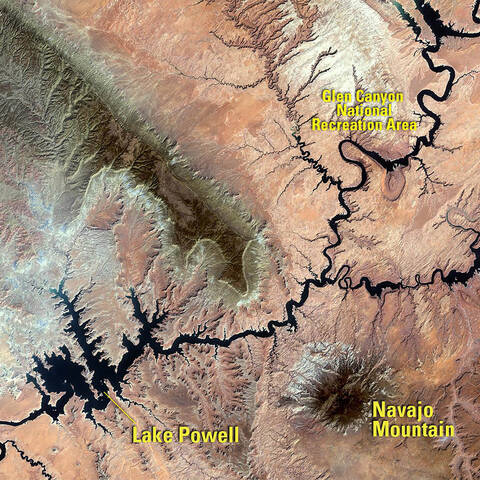 This+image+of+Lake+Powell+was+taken+in+2018+following+a+period+of+drought+that+began+in+2000.+When+the+water+volume+was+measured+five+months+later%2C+it+was+less+than+half+of+what+the+lake+can+hold.+Powell+is+a+reservoir%2C+formed+in+1963+when+the+Glen+Canyon+Dam+was+built+on+the+Colorado+River.+It+lies+primarily+in+Utah%2C+with+its+southern+end+at+the+dam+in+northern+Arizona.