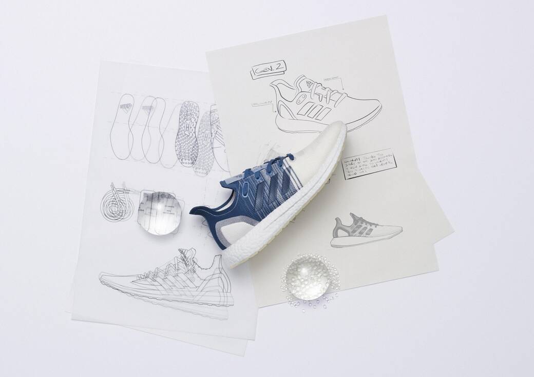 A FUTURECRAFT.LOOP running shoe, along with sketches of the shoe, created by Al Van Noy