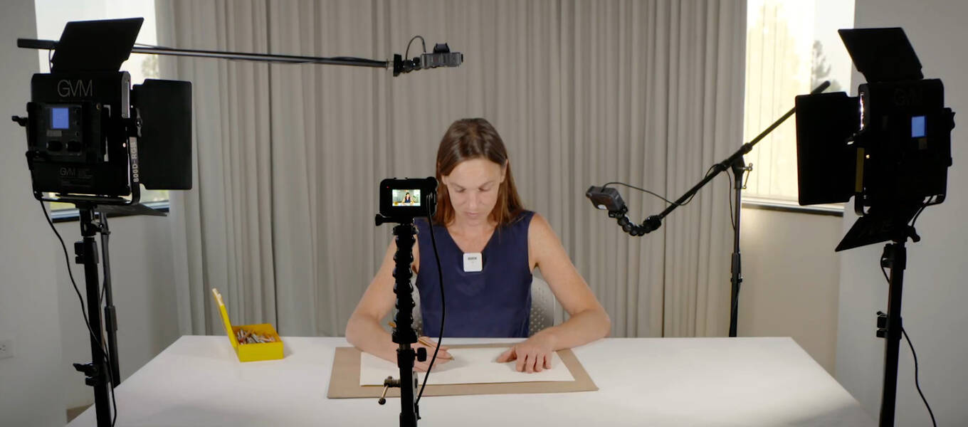 Assistant Media Production Coordinator Lyndsay Bloom demonstrating using a Studio in a Box kit at ArtCenter