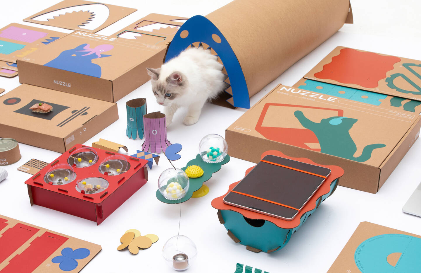 NUZZLE+is+a+DIY+kit+subscription+service+that+offers+open-ended+bonding+%26+enriching+experience+for+pets+%26+their+parents.+The+current+cat+collection+includes+4+kits%3A+Car+Sushi+Kit%2C+Weird+Aquarium%2C+My+Balldi%2C+and+C%40T-BOX.