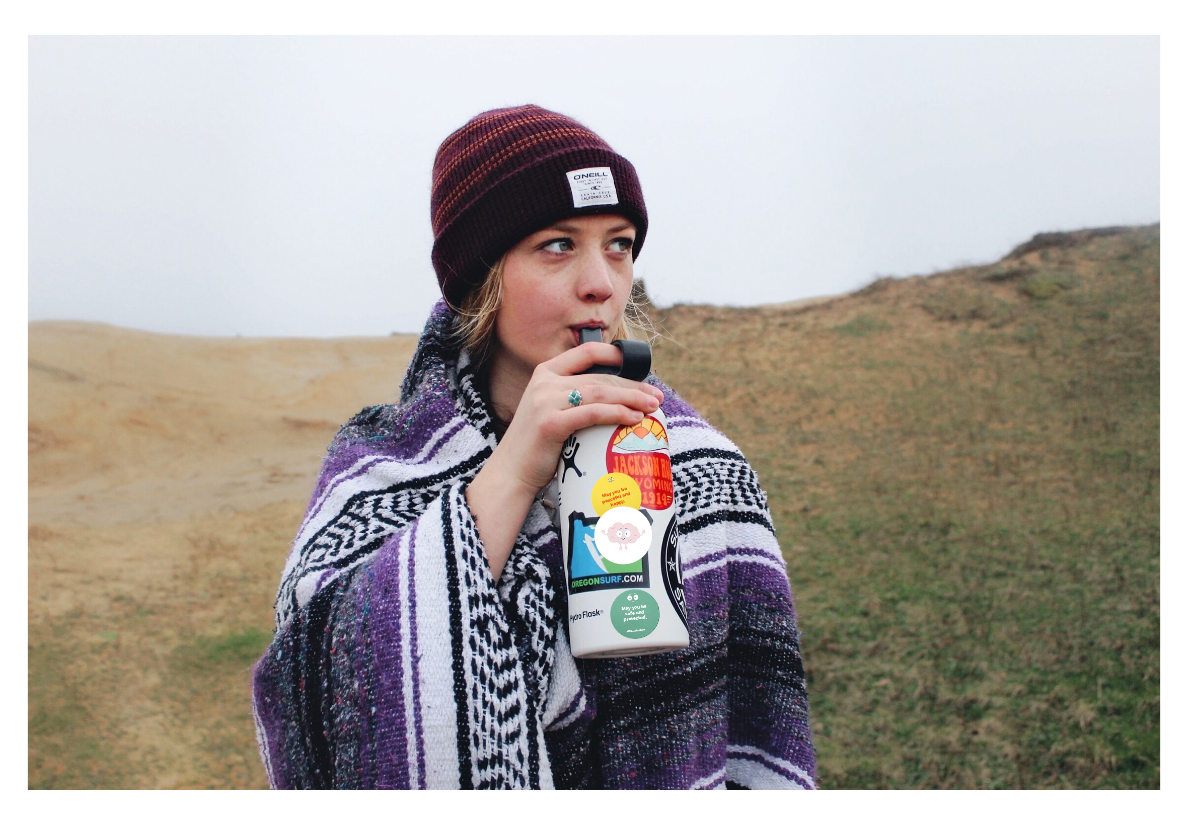 Photo of a teen sipping from a water bottle decorated with stickers designed for the Me and My Emotions campaign designed by ArtCenter students for a Designmatters class and implemented by a nonprofit partner to help teens with mental wellbeing.