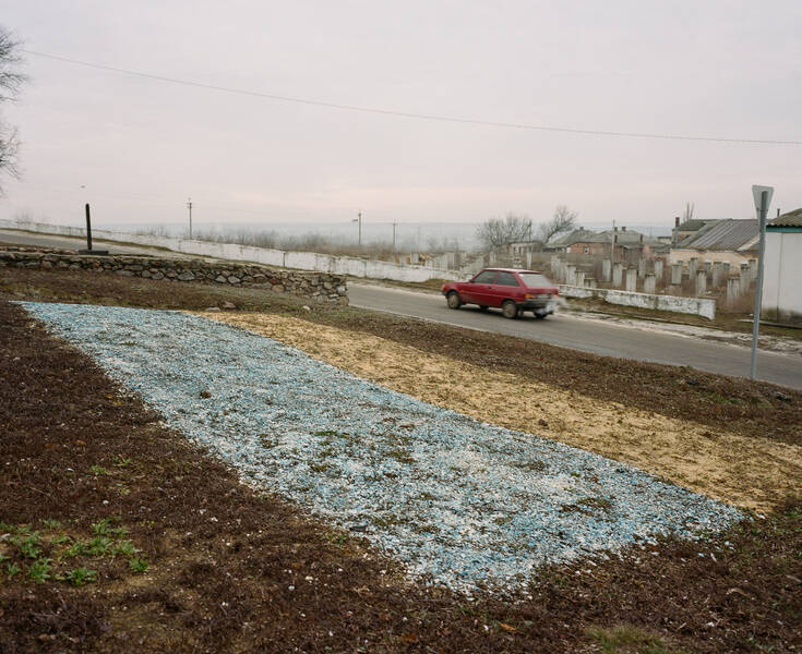 Ukranian+flag+at+a+memorial+in+Kupyansk%2C+near+Izium%2C+Ukraine%2C+honoring+the+victims+of+the+man-made+famine+Holodomor%2C+March+2020.+Photo+by+Kalinina+for+her+project+%3Ci%3EWhere+They+Wait+for+Me%3C%2Fi%3E.