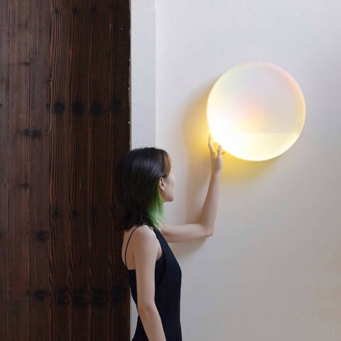 Revolve+wall+light+creates+a+sanctuary+inspired+by+the+rhythms+of+the+changing+sun