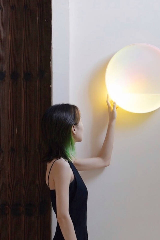 Revolve wall light by Echo Zhan