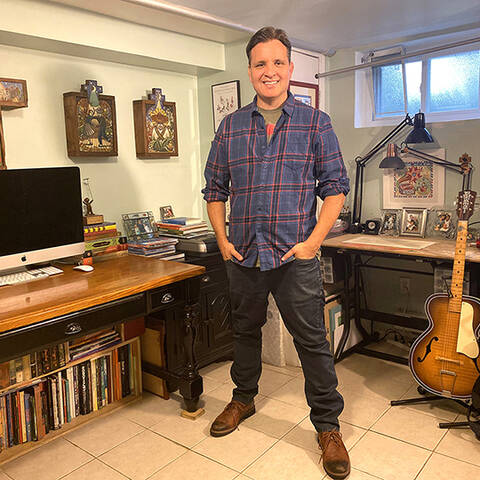 Illustrator John Parra in his studio