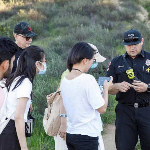 Pasadena Firefighter show students plant sample