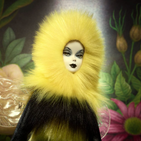 /Bedazzled barbie doll with a yellow bumble bee constume