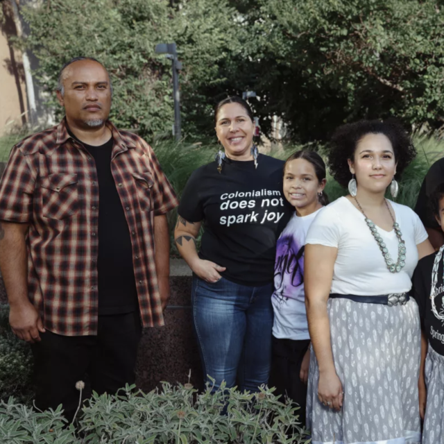 /Joel Garcia, from left, Kimberly Robertson, Farrah Ramos, Samantha Morales-Johnson, Isaac Michael, Elizabeth Recalde and Kimberly Morales-Johnson pose for a portrait during the Indigenous Peoples’ Day celebration at Grand Park on Oct. 10 in Los Angeles. (Dania Maxwell / Los Angeles Times)