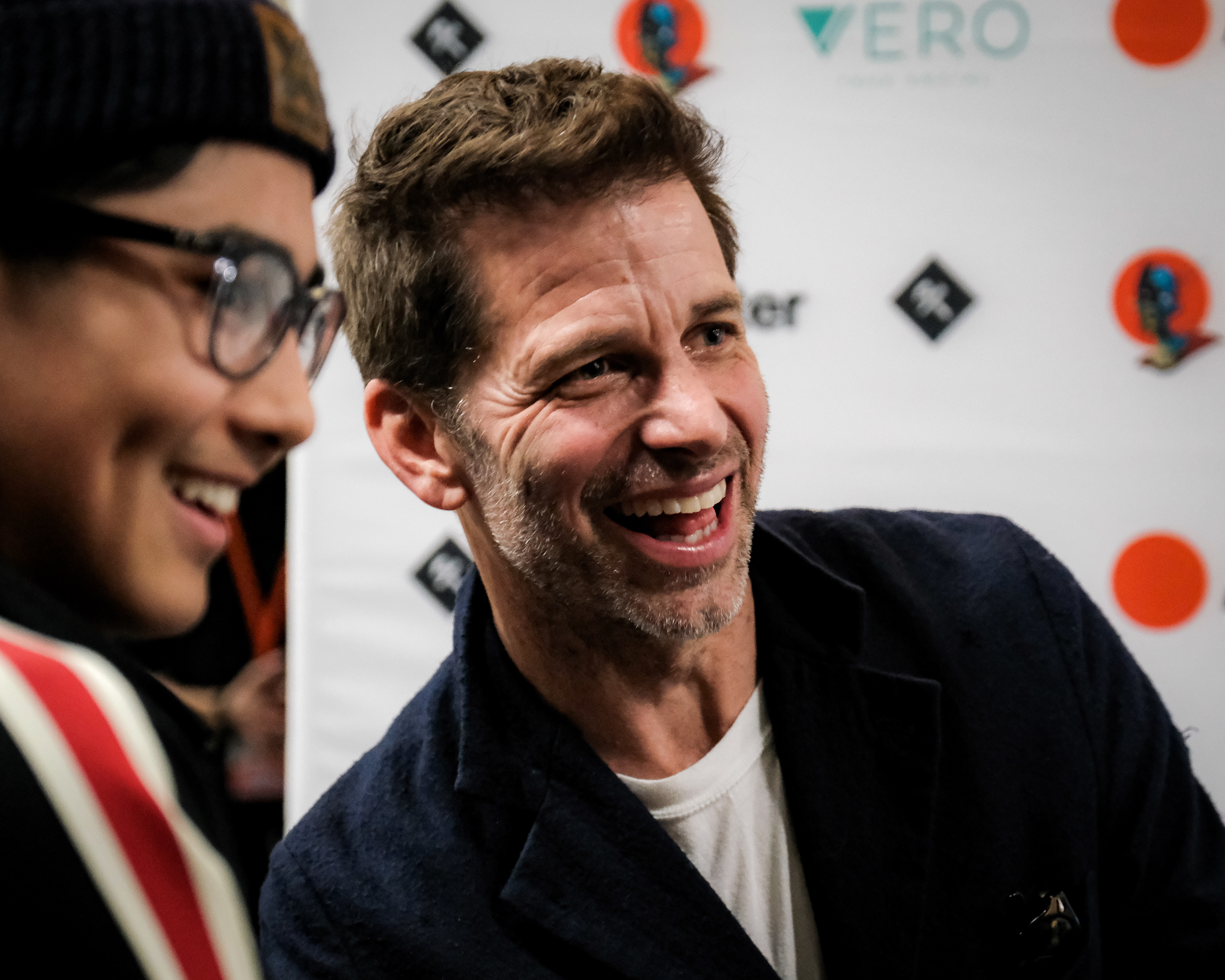 Image of Zack Snyder with an ArtCenter student at a movie marathon in 2019.