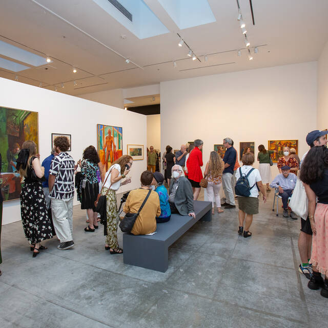 Visitors explore the Advance of the Rear Guard: Ceeje Gallery in the 1960s in ArtCenter