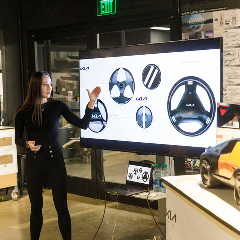 ArtCenter transportation design student presents their steering wheel designs.