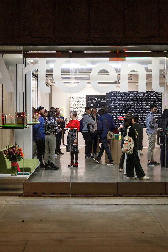 Visitors enjoy the Quasi exhibition opening at ArtCenter College of Design.