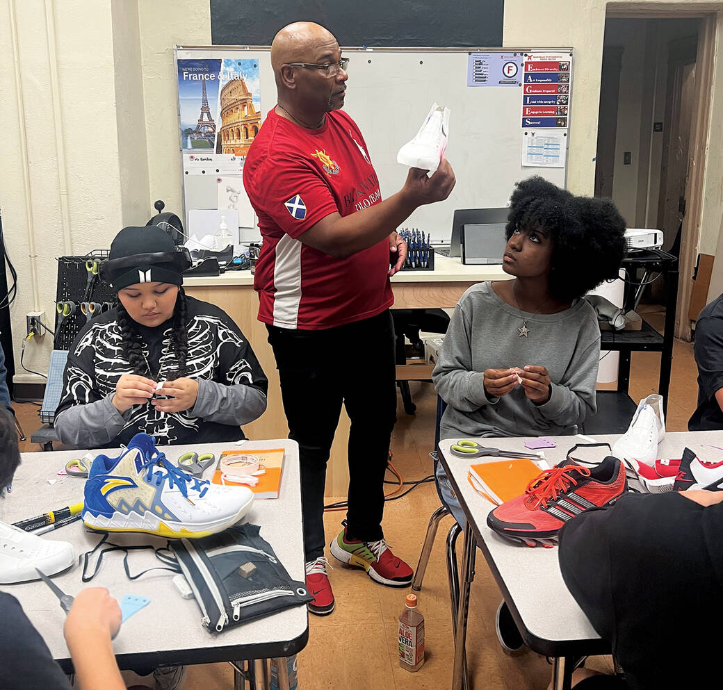 Alum and Associate Professor Roosevelt "Rose" Brown" teaching high school students in a Sneaker Science workshop. Photo courtesy of Brown.