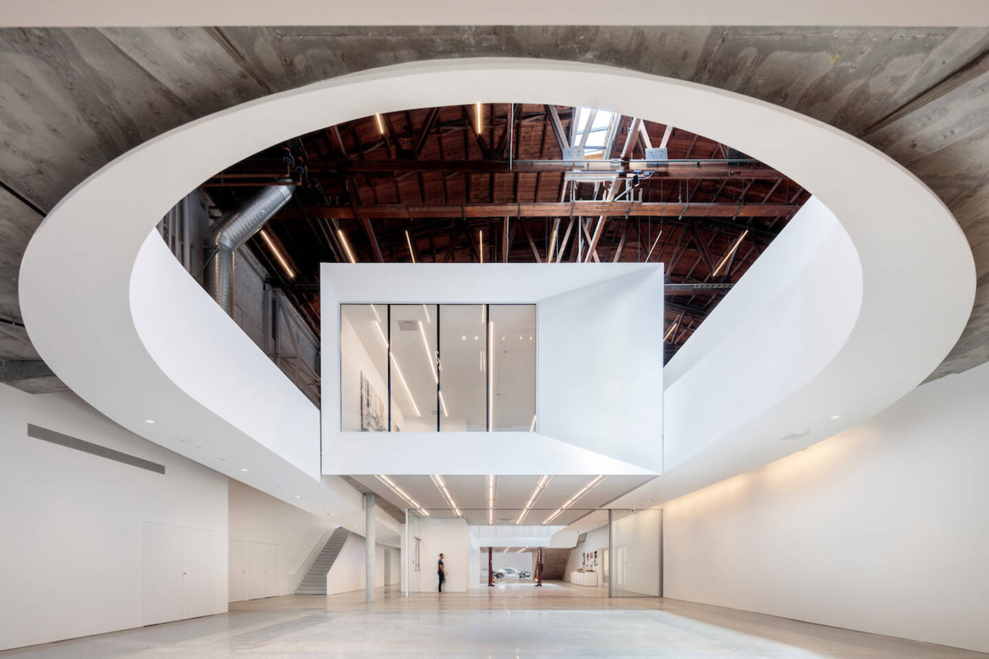 New+gallery+and+exhibition+space+and+a+hovering+mezzanine+provide+opportunities+for+greater+public+exposure+to+the+evolution+of+large-scale+designs+as+they+take+shape.+Photo+by+Joshua+White.+Design+by+Darin+Johnstone+Architects.