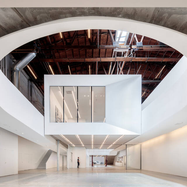 New+gallery+and+exhibition+space+and+a+hovering+mezzanine+provide+opportunities+for+greater+public+exposure+to+the+evolution+of+large-scale+designs+as+they+take+shape.+Photo+by+Joshua+White.+Design+by+Darin+Johnstone+Architects.