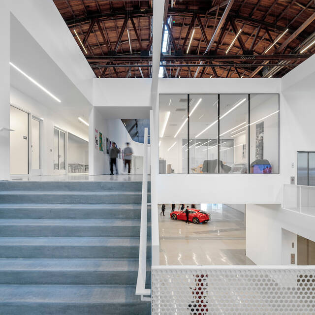 New+gallery+and+exhibition+space+and+a+hovering+mezzanine+provide+opportunities+for+greater+public+exposure+to+the+evolution+of+large-scale+designs+as+they+take+shape.+Photo+by+Joshua+White.+Design+by+Darin+Johnstone+Architects.