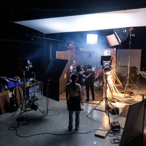 ArtCenter film stage with professional lighting and equipment, showcasing campus facilities for prospective students.