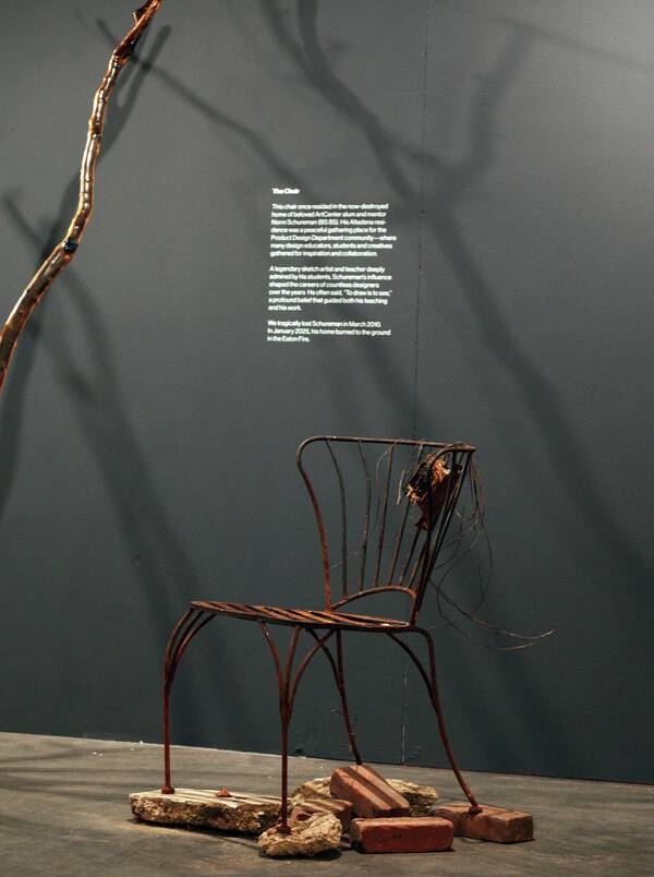 The Chair, a burnt chair salvaged from the Eaton Fire-destroyed residence of a beloved Product Design alum and faculty member, the late Norm Schureman, accompanied by a poem by Spatial Experience Design Associate Chair James Meraz, part of the installation Resilience in the Ashes at ArtCenter