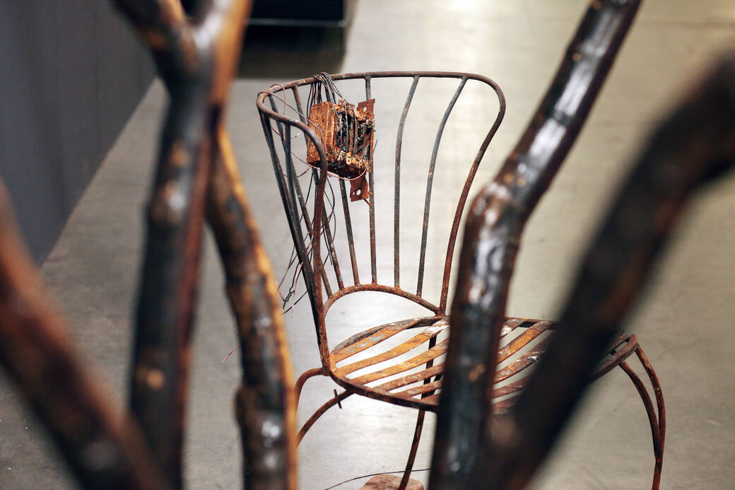 The Chair, a burnt chair salvaged from the Eaton Fire-destroyed residence of a beloved Product Design alum and faculty member, the late Norm Schureman, part of the installation Resilience in the Ashes at ArtCenter