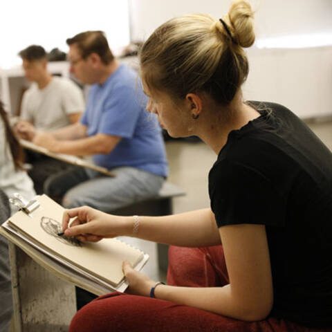 /In figure drawing, students work from live models to build confidence in capturing movement, anatomy, and expression.