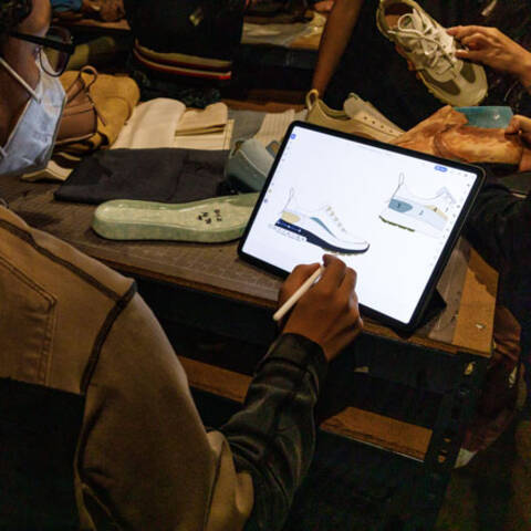 /Students design original sneakers, learning sketching, form, and material details.