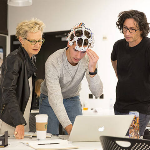 /Student building an interactive project in Interaction Design class at ArtCenter Summer Extension using creative coding and digital tools.