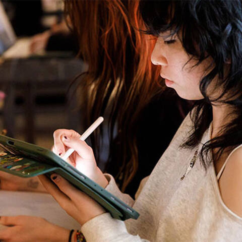 /High school students sketching in Creature Design class at ArtCenter Summer Extension, working on an animal sketch.