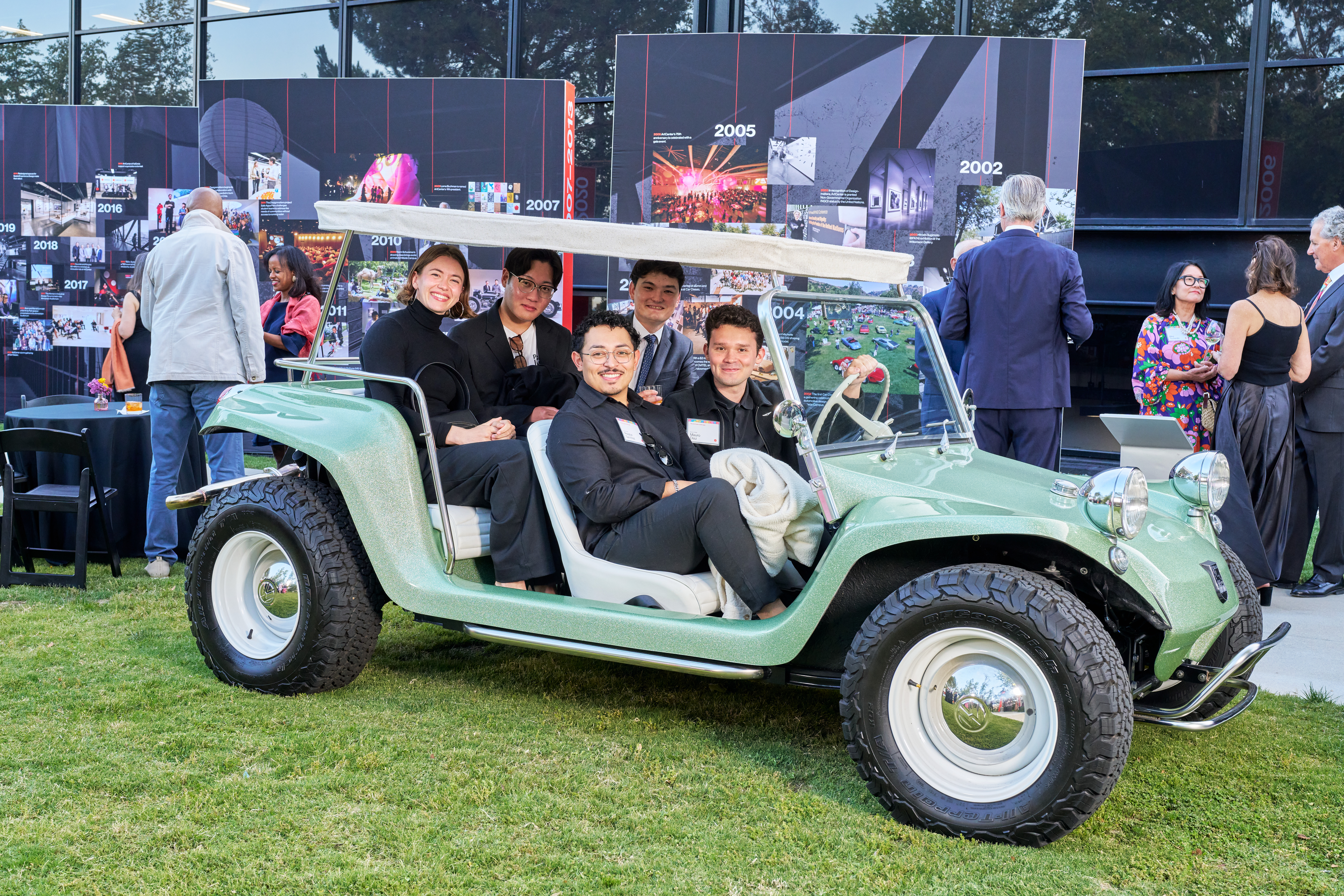 (L-R) Transportation Design alumni [insert name], [insert name], Preston Sanchez (BS 24), [insert name] and Mauro Diaz (BS 25) at ArtCenter