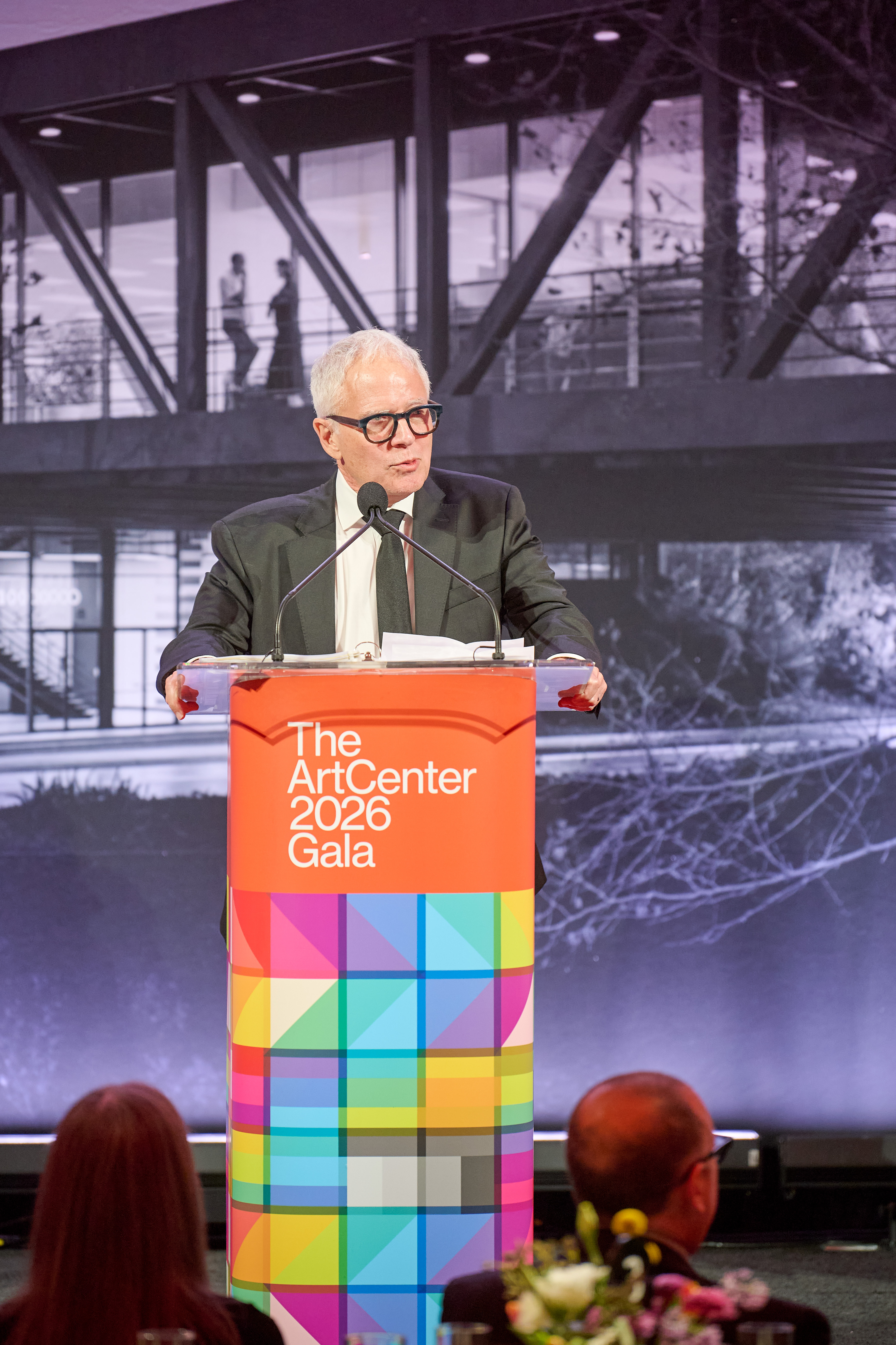 President Emeritus Lorne M. Buchman speaking at ArtCenter&rsquo;s 2026 Gala.