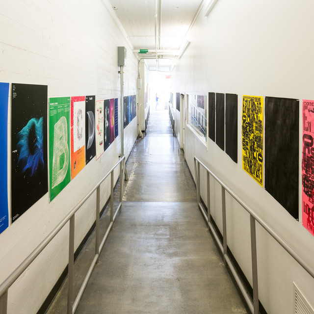 Posters line an ArtCenter hallway