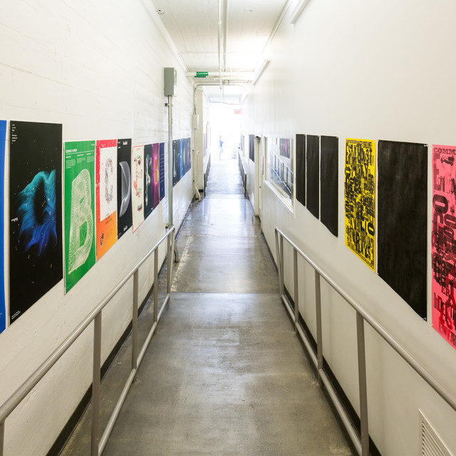 posters lining a hallway