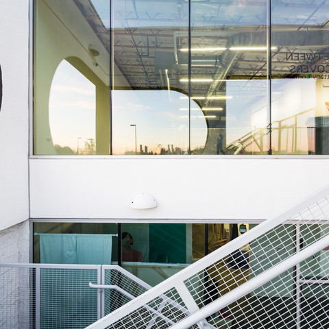 Dramatic architectural detail shot of stairs windows with reflected shapes at the 870 building