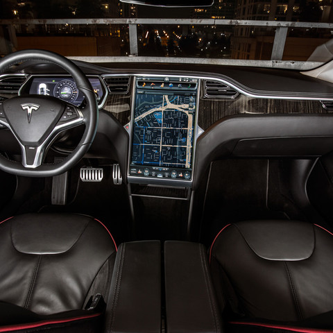 /Interior of a vehicle looking at the steering wheel and dashboard