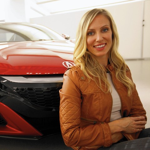 /Michelle Christensen in front of a red acura