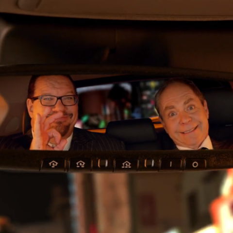 /Photo of Penn and Teller in a rear view mirror by Anthony Cardenas